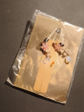 Paire de boucles d’oreilles vintage fleurs pendantes, deadstock, tons pastel