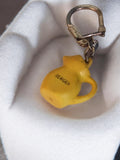 Porte-clés vintage Berger pichet jaune ancien rétro publicité années 60
