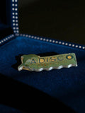 Pin's publicitaire ADISCO Groupement vintage forme originale