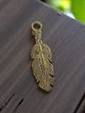 Pendentif plume vintage métal doré années 50 bijou rétro deadstock