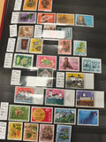 Timbres Suisse Helvetia x24 thématiques 1970s – fleurs, architecture, animaux, o
