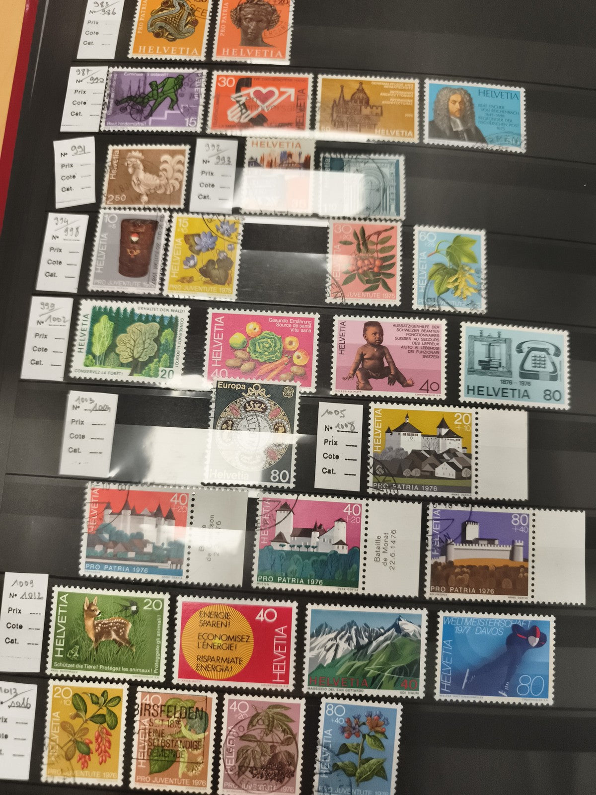 Timbres Suisse Helvetia x24 thématiques 1970s – fleurs, architecture, animaux, o