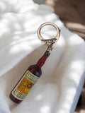 Porte-clés bouteille BARTISSOL MUSCAT ancien vintage objet publicitaire rétro
