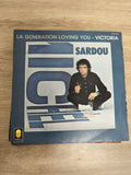 Vinyle 45 tours Sardou La Génération Loving You Victoria pochette bleue dédicacé
