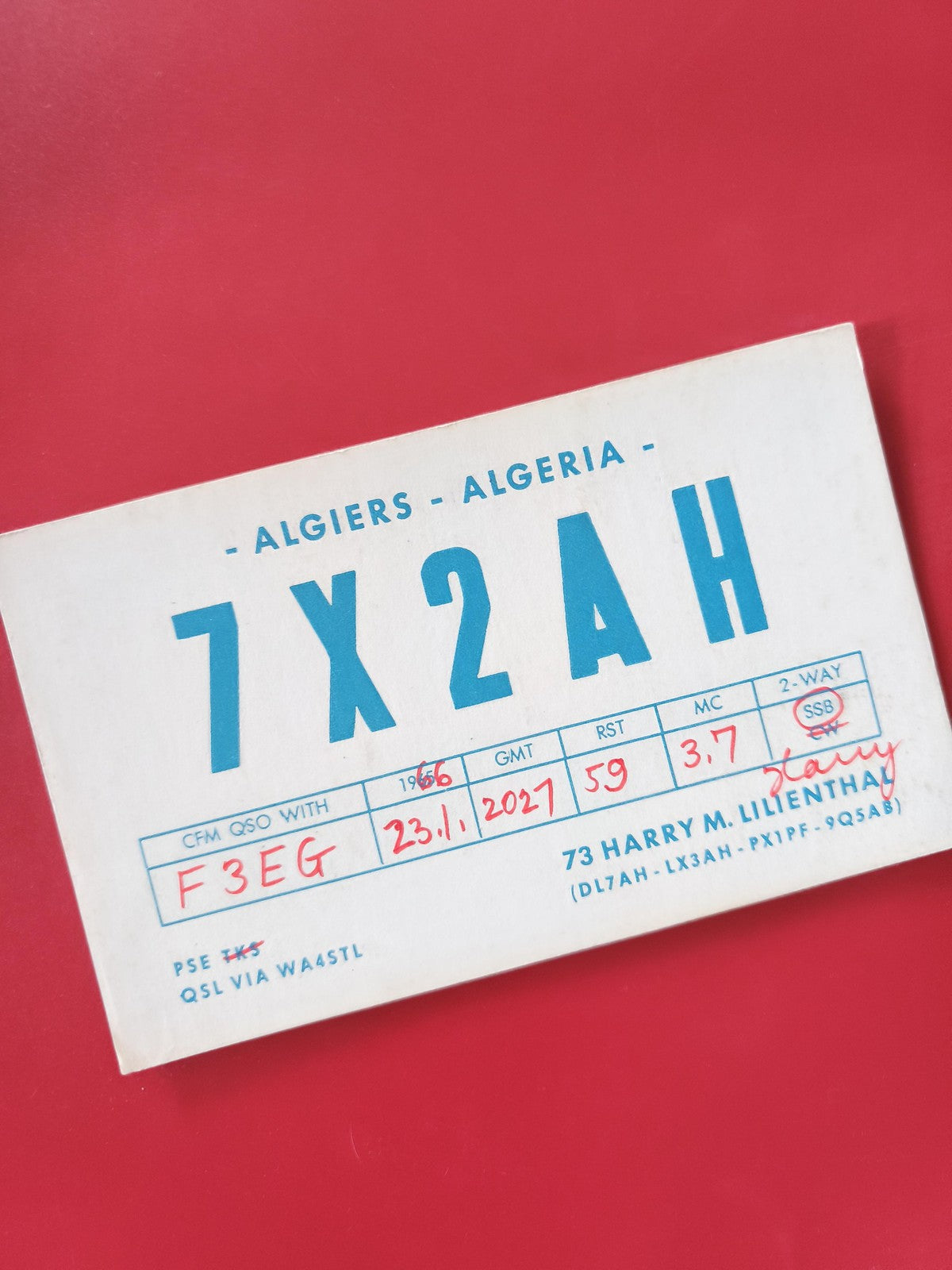 Carte QSL radioamateur 7X2AH Alger Algérie, carte écrite, fond blanc et bleu