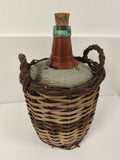 Ancienne dame-jeanne en verre vert avec panier osier, déco vintage rétro