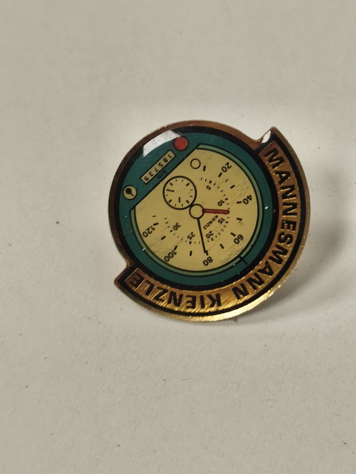 Vintage pin's ancien Manesmann Keunezle rétro collection badge publicitaire rare