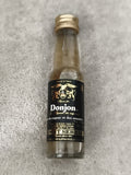 Miniature liqueur Donjon Benoit Serres cognac amande flacon partiellement rempli