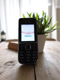 Téléphone Nokia vintage fonctionnel noir clavier SMS sans chargeur rétro