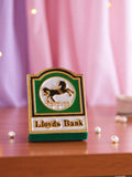 Pin's Lloyds Bank émaillé vintage rétro publicité vert or logo cheval