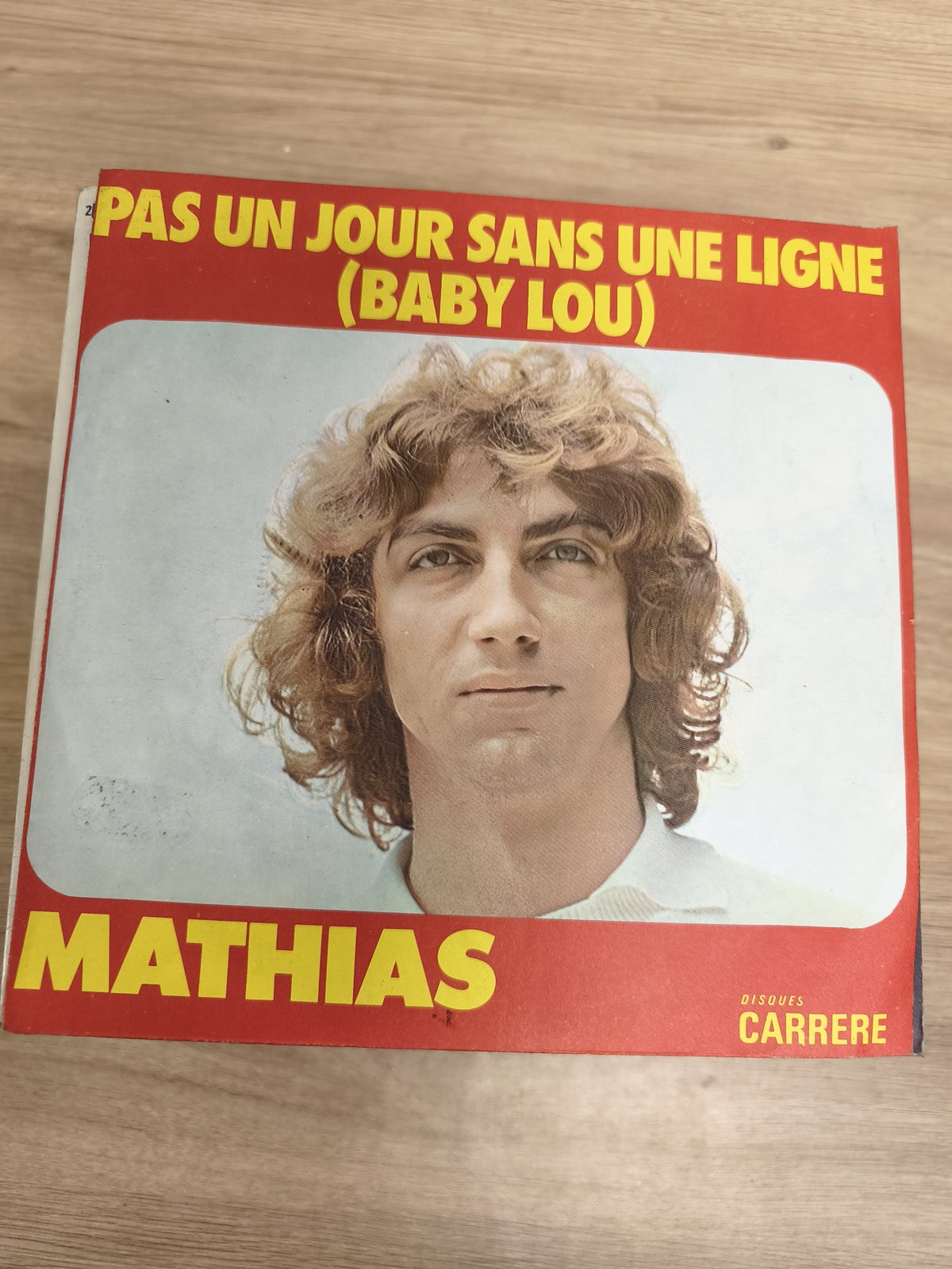 Vinyle 45 tours Mathias Pas un jour sans une ligne (Baby Lou) Disques Carrere