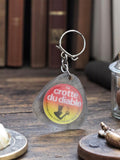 Porte-clés vintage publicitaire La Crotte du Diable rétro métal et résine transl