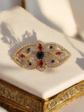Broche vintage strass dorée motif baroque rouge noir – Bijou fantaisie femme