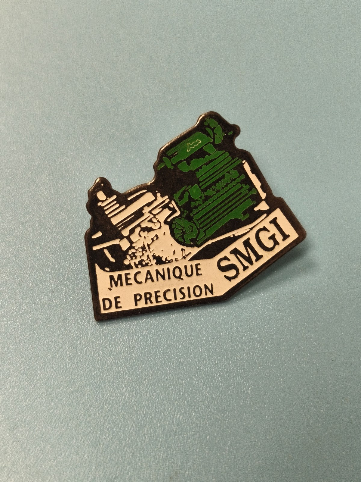 Vintage pin's SMGI mécanique de précision, vert et blanc, ancien badge industrie