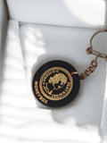 Porte-clés vintage Moneybox noir médaillon doré publicitaire ancien rétro