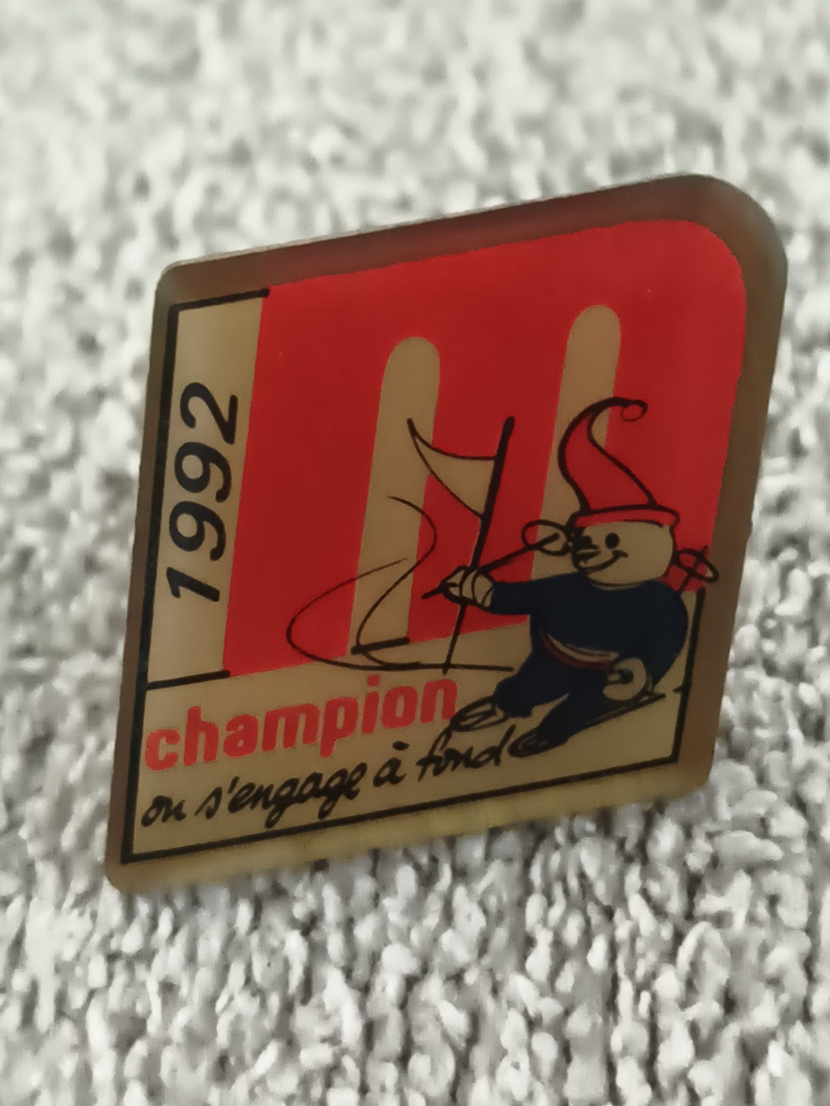 Pin's vintage Champion 1992 mascotte voile, badge rétro années 90 (Ref 7)
