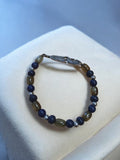 Bracelet perles vintage bleu marron, fermoir plume rétro fantaisie ancien