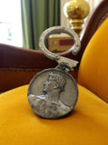Porte-clés vintage métal F.A.C. Lyon médaillon profil laurier ancien