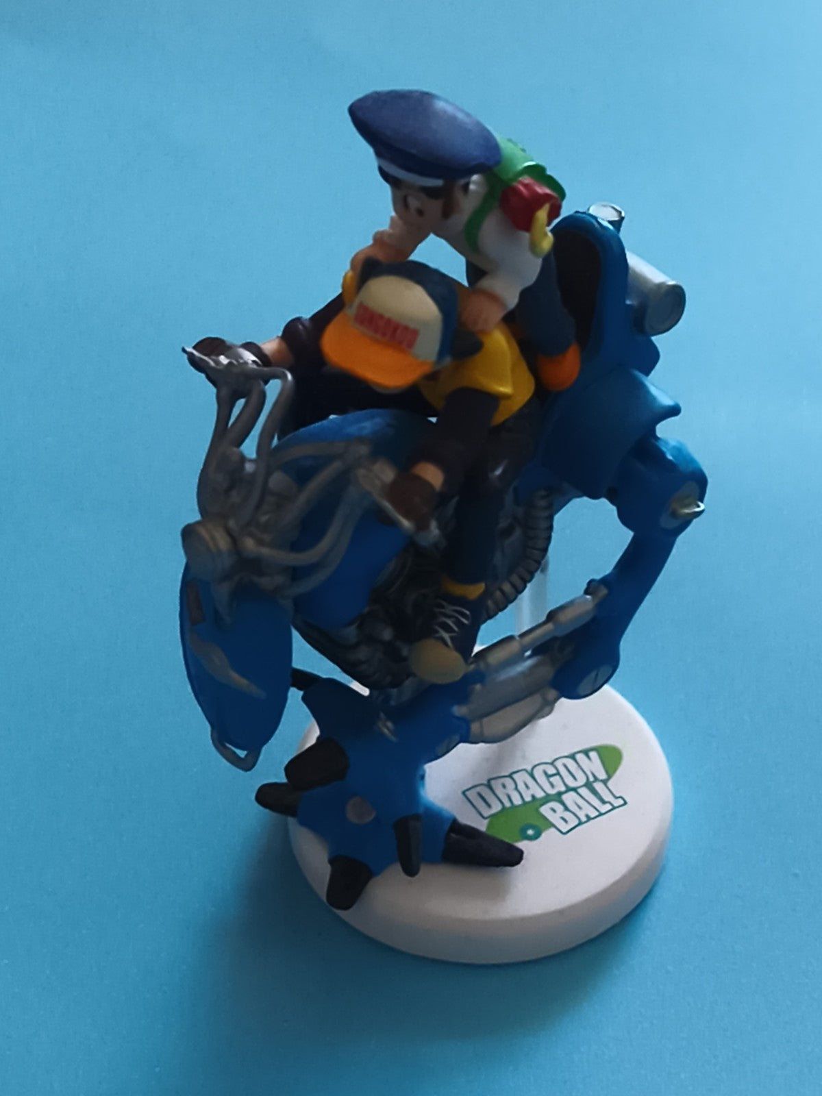 Figurine Dragon Ball moto bleue Akira Toriyama DBZ support logo