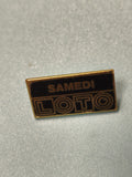 Vintage pin's Loto Samedi noir doré collection jeu ancien (ref 11)