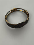 Bracelet jonc vintage noir doré motif floral ancien bijou rétro