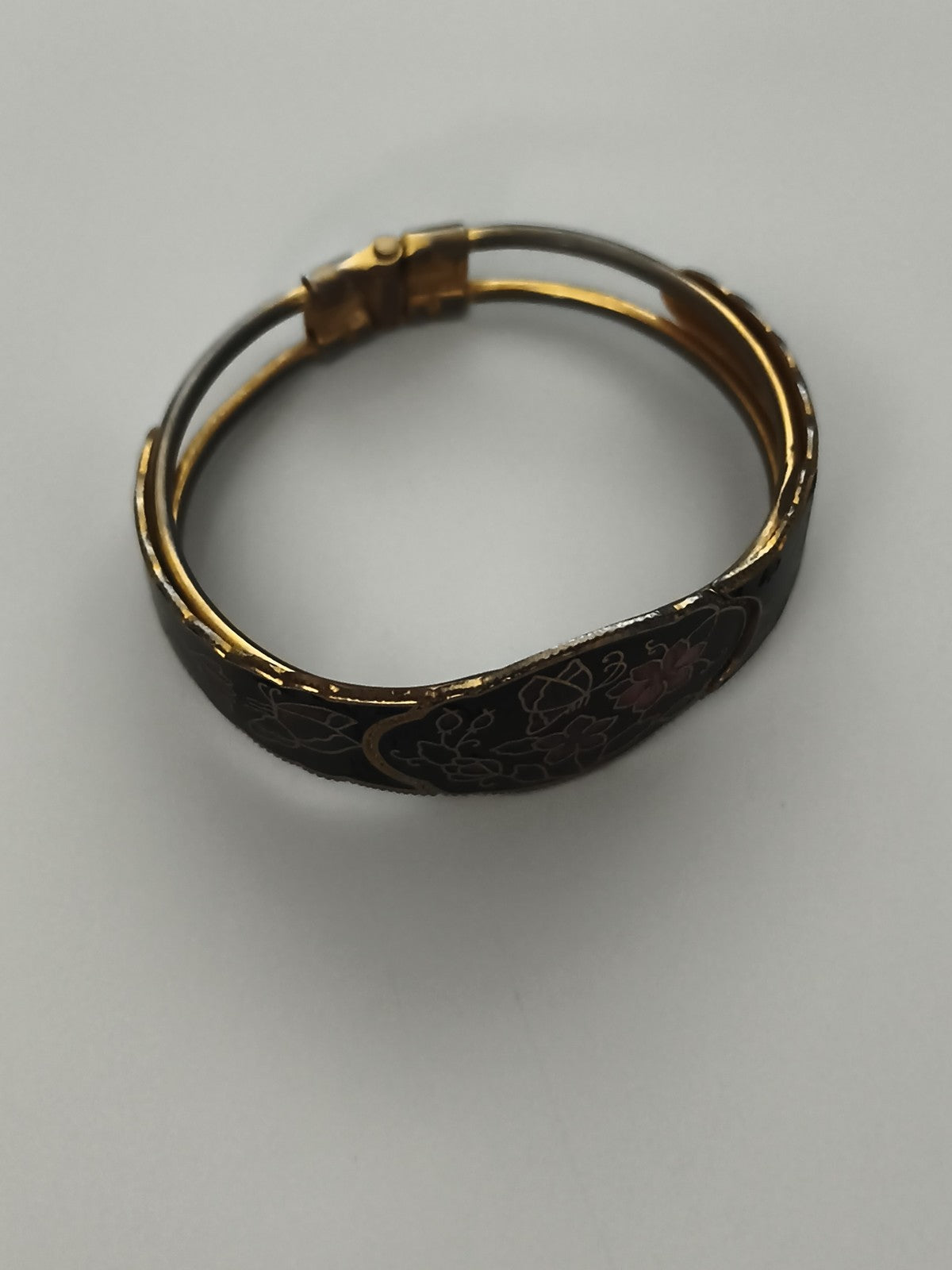 Bracelet jonc vintage noir doré motif floral ancien bijou rétro