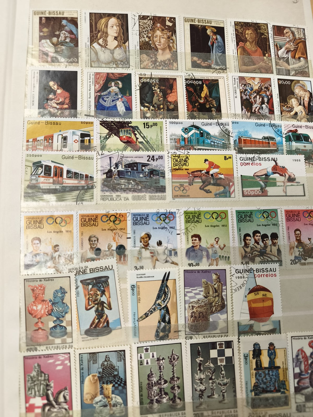 Lot timbres Guinée-Bissau thèmes art, sport, trains, jeux, oblitérés