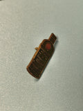 Vintage pin's bouteille alcool vert ? objet publicitaire ancien collection bar