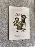 Carte postale Bonne Année chiens panier houx illustration CPA