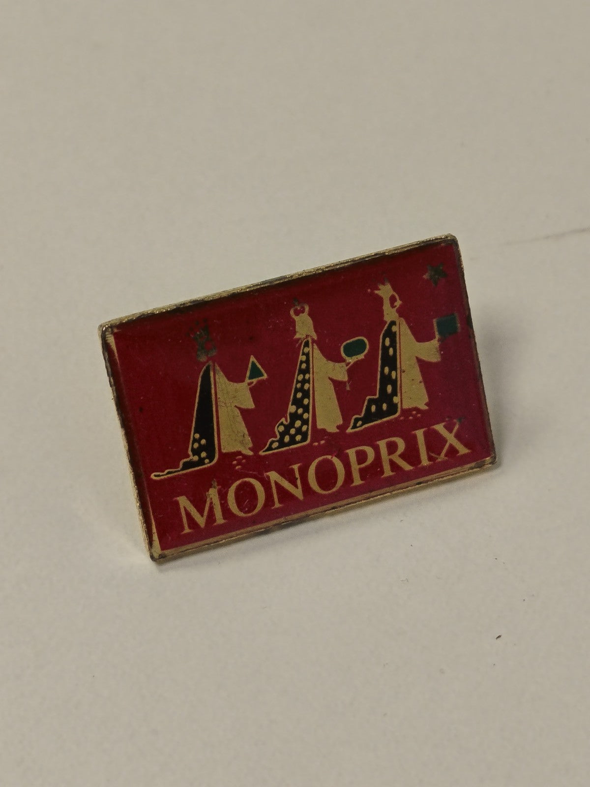 Pin's ancien Monoprix rétro collection années 90 badge vintage rare France
