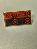 Pin's vintage Loto 6 sur 49 rectangulaire émaillé rouge et bleu collection
