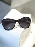 Lunettes de soleil Guess vintage noires rétro années 80 accessoire mode ancien