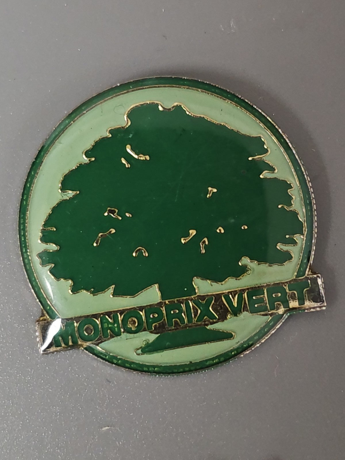 Pin's ancien Monoprix vintage rétro collection badge publicitaire France