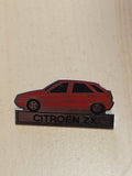 Pin's ancien Citroën ZX, badge rétro collection auto, accessoire vintage rare