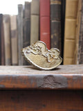 Pin's publicitaire vintage, finition dorée, rare ancien badge rétro