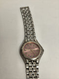Montre vintage Oremie quartz cadran rose acier aspect sport non testée