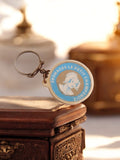 Porte-clés publicitaire vintage Fromages Le Petit Champenois rond bleu blanc rét
