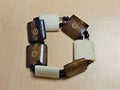 Bracelet vintage ancien ethnique en bois et os, bijou artisanal rétro collection