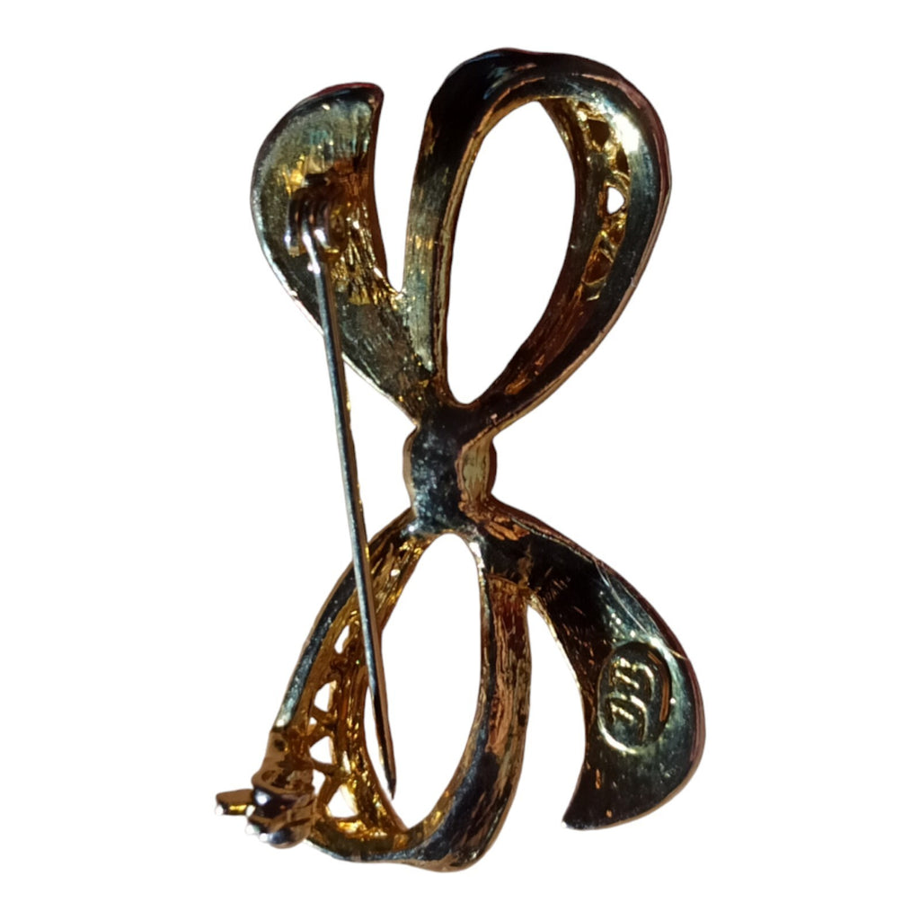 Broche vintage nœud doré style rétro élégant, métal doré, perle centrale
