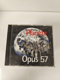 CD musique Planète Opus 57 ? Boîtier cristal, pochette Terre et groupe