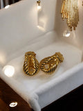 Paire de boucles d’oreilles vintage rétro dorées, clip fantaisie ancien