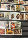 Lot de timbres GUYANA thématiques sports, faune, flore et art, couleurs variées