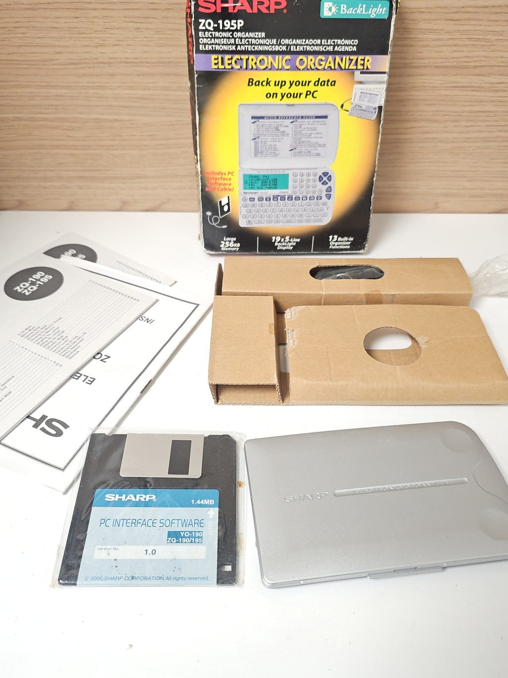 Organiseur électronique Sharp ZQ-195P - Assistant personnel compact d'occasion