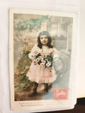 Carte postale ancienne fillette bouquet, vœux Nouvel An, timbre 10c, début XXe
