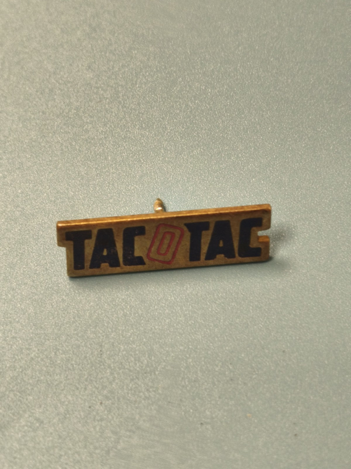 Vintage pin TACOTAC old, rectangular, colored logo, lottery collection