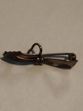 Broche vintage nœud ruban, finition dorée, style rétro bijou ancien