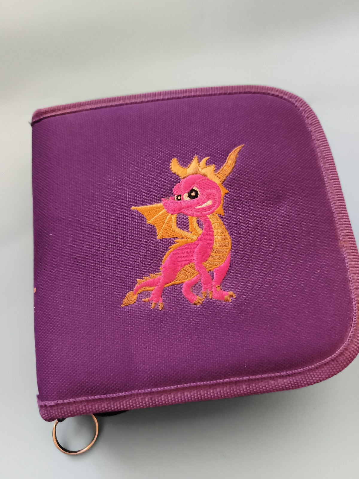 Pochette jeux Playstation violette dragon brodé vide étui CD zip