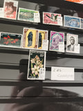 Timbres Archipel des Comores RF lot thématique fleurs animaux bâtiments