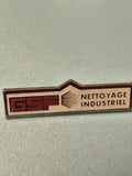 Vintage pin's GSF Nettoyage Industriel badge ancien publicitaire rectangulaire