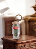 Porte-clés vintage publicitaire Marcel Gras olives transparent rétro années 70